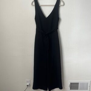 Elegant Black Sleeveless Backless V-Neck Jumpsuit with Pockets!